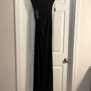 Black strapless evening gown or prom dress.